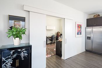 Modern apartments with home office space—perfect for remote work. Spacious layouts with sliding privacy doors